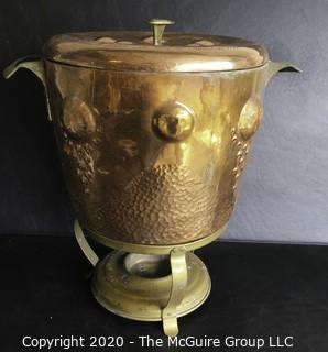 Antique Large Hammered Copper Lidded Pot with Brass Warming Stand.  Lid has inscription written in German dated 1908.  Measures approximately 10" with Stand.