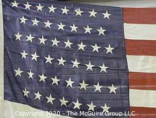 Large 45 Star American Flag with Stitched Stripes and Printed Stars; 1896-1906; Measures approximately 62 x 88".