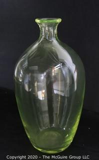 Tall Vaseline Glass Vase.  Measures approximately 12" tall. 