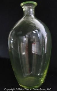 Tall Vaseline Glass Vase.  Measures approximately 12" tall. 