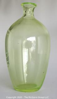 Tall Vaseline Glass Vase.  Measures approximately 12" tall. 