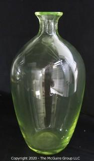 Tall Vaseline Glass Vase.  Measures approximately 12" tall. 