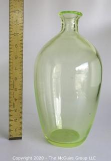 Tall Vaseline Glass Vase.  Measures approximately 12" tall. 