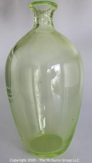 Tall Vaseline Glass Vase.  Measures approximately 12" tall. 