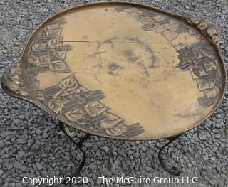 Persian Copper Tray Coffee Table with Cast Iron Stand.  Measures approximately 26" in diameter and 19" tall. 