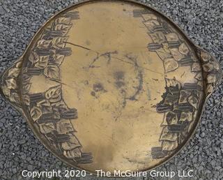 Persian Copper Tray Coffee Table with Cast Iron Stand.  Measures approximately 26" in diameter and 19" tall. 