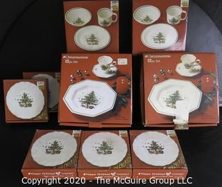 Several New Boxed Place Settings of Christmastime China.