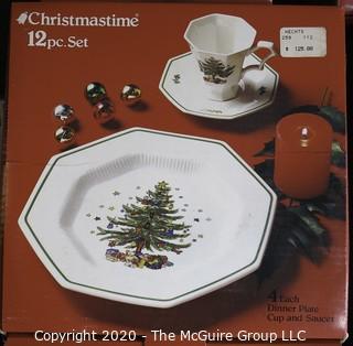 Several New Boxed Place Settings of Christmastime China.