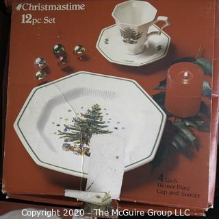 Several New Boxed Place Settings of Christmastime China.