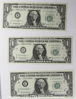 (9) Series E 1 dollar U.S. Currency Notes