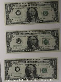 (9) Series E 1 dollar U.S. Currency Notes