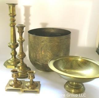 Collection of brass housewares, including candlesticks