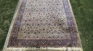 Kerman Persian Circa 1940 Hand Knotted Wool on Wool Rectangular Field with Flowers and Leaves on Beige Ground Surrounded by Five Border Guards.  Measures approximately 105" x 145".