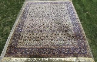 Kerman Persian Circa 1940 Hand Knotted Wool on Wool Rectangular Field with Flowers and Leaves on Beige Ground Surrounded by Five Border Guards.  Measures approximately 105" x 145".