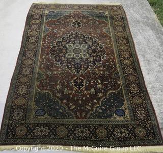 Hamadan Hand Knotted Wool with Central Cartouche in Floral Motif on Indigo Surrounded by Seven Border Guards. Measures approximately Measures approximately 49" x 78".