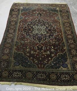 Hamadan Hand Knotted Wool with Central Cartouche in Floral Motif on Indigo Surrounded by Seven Border Guards. Measures approximately Measures approximately 49" x 78".