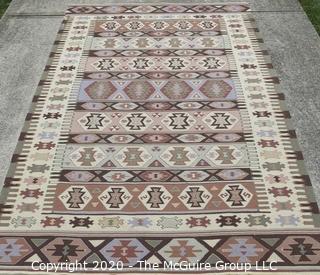 Hand Knotted Wool Kilim Rug with Geometric Pattern in Brown on Beige Ground.  Measures approximately 105" x 67".