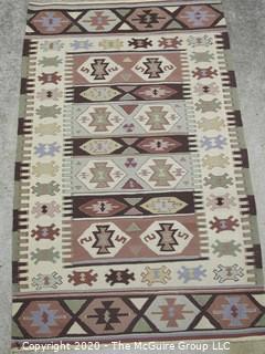 Small Hand Knotted Wool Kilim Rug with Geometric Pattern in Brown on Beige Ground. 