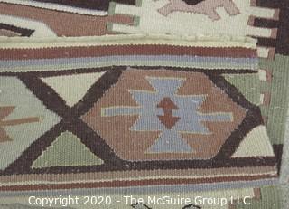 Small Hand Knotted Wool Kilim Rug with Geometric Pattern in Brown on Beige Ground. 