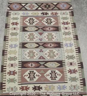 Small Hand Knotted Wool Kilim Rug with Geometric Pattern in Brown on Beige Ground. 