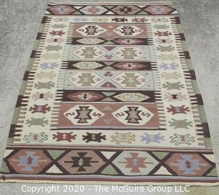 Small Hand Knotted Wool Kilim Rug with Geometric Pattern in Brown on Beige Ground. 