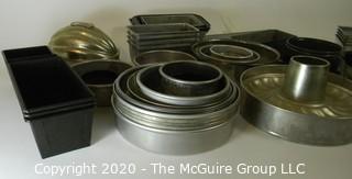 Large Collection of Baking Pans and Molds.