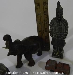 Collection including terra-cotta soldier, assorted brass and several pachyderms