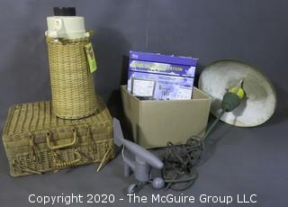 Collection including a weather station kit, an electric garden light, a wicker covered pump thermos and a wicker picnic basket 