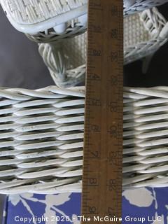 Antique White Painted Wicker Wing Back Armchair and Matching Side Table with Blue Cushions.  