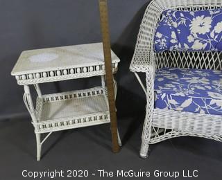 Antique White Painted Wicker Wing Back Armchair and Matching Side Table with Blue Cushions.  