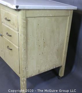 Vintage Hoosier Base with White Enamel Top.  Much Wear and Water Damage to Veneer on both sides; 25"D x 40"W x 33"T  