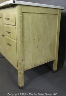 Vintage Hoosier Base with White Enamel Top.  Much Wear and Water Damage to Veneer on both sides; 25"D x 40"W x 33"T  