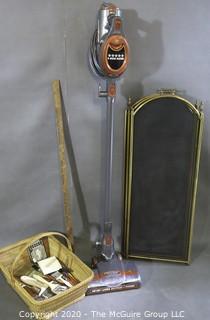 Collection including corded vacuum, Fireplace screen (24" x 52") and assorted paint brushes in basket