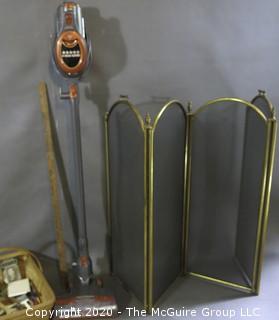 Collection including corded vacuum, Fireplace screen (24" x 52") and assorted paint brushes in basket