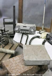 Collection including CB antennas, car radio, (2) metal machinists vices, grease gun, etc. 