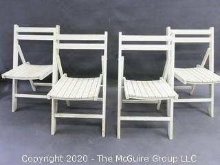 Set of 4 folding wooden chairs  