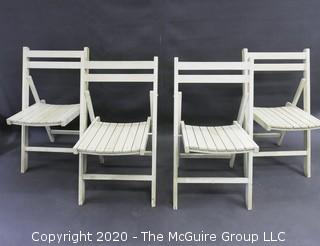 Set of 4 folding wooden chairs  