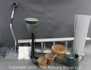 Collection including mosquito magnet, screening, garden supplies, snow shovel and 6 foot aluminum ladder