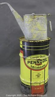 Large Pennzoil grease can (15" diameter x 27"T; nearly empty) and metal watering can