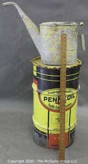 Large Pennzoil grease can (15" diameter x 27"T; nearly empty) and metal watering can