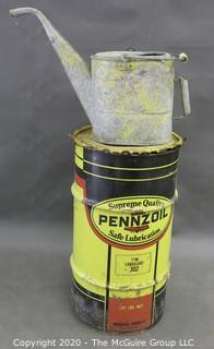 Large Pennzoil grease can (15" diameter x 27"T; nearly empty) and metal watering can