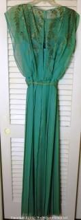 Two Vintage Evening Dresses. Unsized. Green Dress Made By Marita for Anthony Muto.  White dress has a few spots on it from storage.