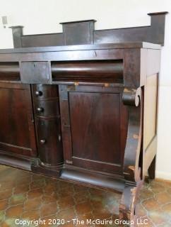 Heavy Antique Victorian Mahogany Buffet Cabinet.  Damage to the veneer and top decorative bracket needs to be reattached; 46"T (54" at back) x 28"D 