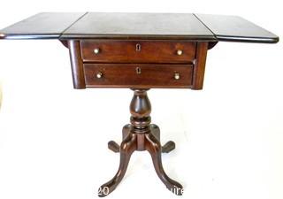 Pedestal drop leaf mahogany two drawer side table; 28"T x 34"W (with leaves up)