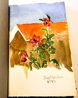 Two small sketch books with approx. _ watercolors 