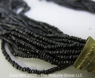 Brass with Multi Strand Black Seed Bead Necklace.