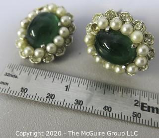 Vintage Marvella Clip On Earrings with Translucent Green Cabochon and Faux Pearl Surround.  Missing a pearl. 