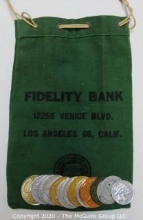 Vintage Fidelity Bank of Los Angeles Cash Bank and Miscellaneous Tokens and Coins.  Includes many Mardi Gras doubloons.