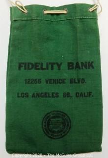 Vintage Fidelity Bank of Los Angeles Cash Bank and Miscellaneous Tokens and Coins.  Includes many Mardi Gras doubloons.