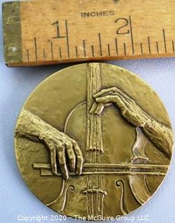 1973 Heavy Bronze Commemorative Medal for Pablo Casals, by Elizabeth Jones. This medal measures 2 1/2"in diameter and is marked Medallic Art Bronze.  Elizabeth Jones was the first  Chief Sculptor and Engraver of the United States Mint.